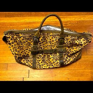 Cheetah faux hair Duffle Bag with leather handles